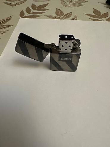 meta eynək: Məhsul: Zippo benzinli çaxmaq Xüsusiyyətlər: - Brend: Zippo — 5