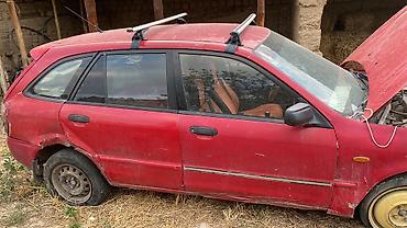 rox 01: Mazda 323: 2003 г., 1.6 л, Механика, Бензин, Универсал — 3