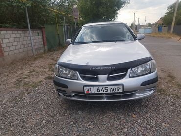 запчасти ниссан альмера: Серебристый седан Nissan Almera с черными молдингами на бамперах и