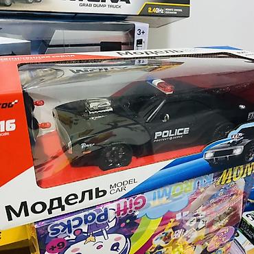 Другие игровые комплексы: Набор игрушек и электроники: 1) Радиоуправляемая модель легкового — 5