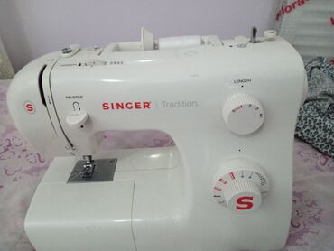 Paltaryuyan maşınlar: Tikiş maşını Singer, Elektromexaniki