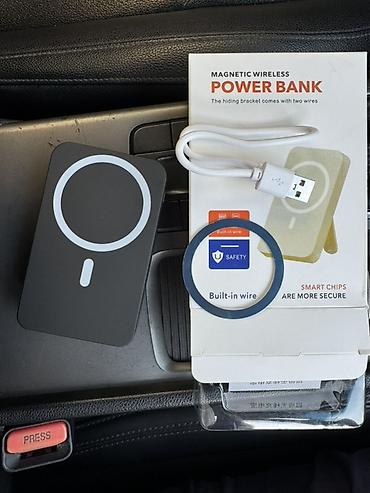 magic arm: Магнитный беспроводной power bank с выдвижной подставкой и встроенными — 4