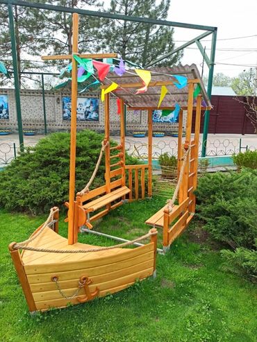 детское кресло качалка электрическое: Корабль. Для детских игровых площадок в садиках. Из дерева. Длина