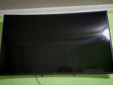 radiator ev: Samsung əyri ekran televizor - Böyük ölçülü, divara quraşdırılmış — 1