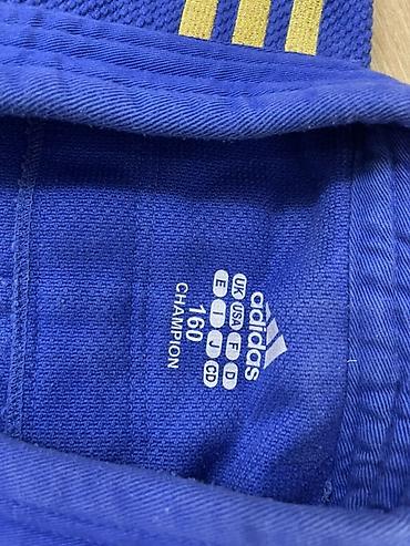пояса дзюдо: Синее кимоно для дзюдо Adidas Champion + штаны Вверх лицензионный - — 5