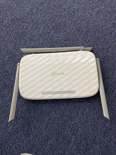 rotor modem: İki işlək router satılır, yaxşı vəziyyətdədir. 1. TP-Link Archer C50 — 1