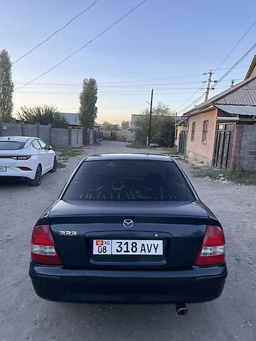 машинка б у: Mazda 323: 1999 г., 1.6 л, Механика, Бензин, Седан — 1