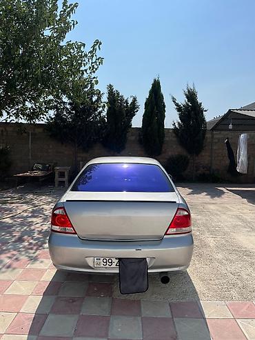 masin cip: Nissan Sunny: 1.6 l | 2008 il Sedan — 2