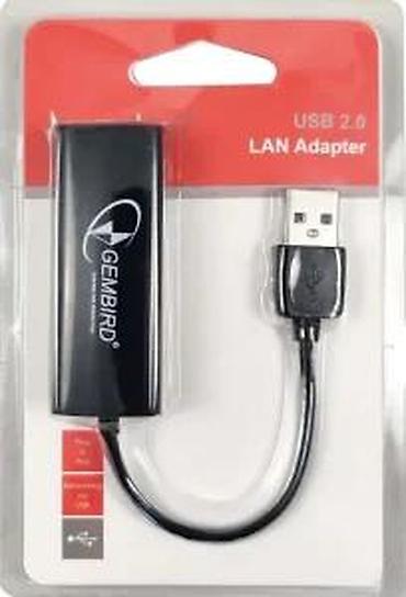 Modemi, ruteri i mrežni uređaji: USB na RJ45 mrežni adapter Opis: - Kompaktan USB–Ethernet adapter — 23