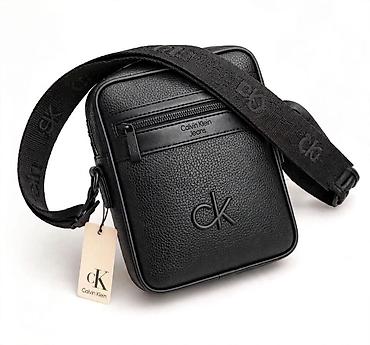 vunene helanke: Calvin Klein Jeans muška crossbody torbica - Materijal: veštačka koža — 1