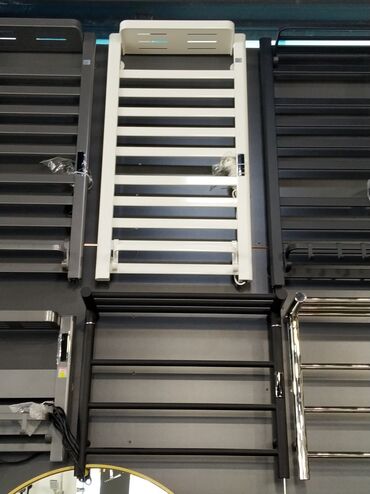 Unitazlar: Məhsul: Divara quraşdırılan elektrikli dəsmal qızdırıcıları (radiator