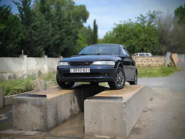 Opel: Opel Vectra B sedan - Kuzov: 4 qapılı sedan, tünd göy rəng - Mühərrik — 5