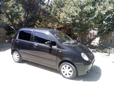 купить двигатель д 245: Автомобиль Daewoo Matiz черного цвета, предназначенный для городской