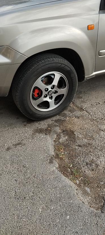 Nissan: Nissan X-Trail: 2 l | 2000 il Universal — 12