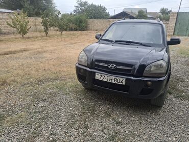 Hyundai: Hyundai Tucson: 0.2 l | 2005 il Ofrouder/SUV