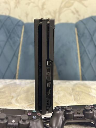 PS4 (Sony Playstation 4): Ps 4 Pro 1 Tb Yaddaş. Klub mali deyil ! EV SERAITINDE ISLENIB — 3