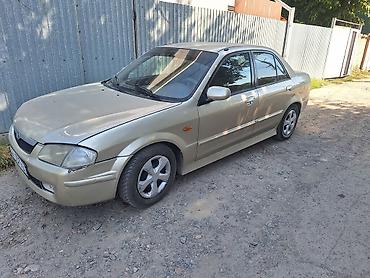 mini coper: Mazda 323: 2000 г., 1.5 л, Автомат, Бензин, Седан — 2
