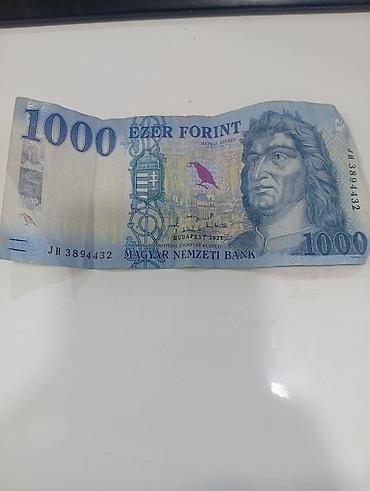 kagiz pullar: Macaristanın rəsmi pul vahidi olan 1000 forint əsginası — 1