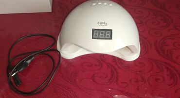 Dırnaq qurutma lampaları: Peşəkar SUN 5 model UV/LED dırnaq qurudan lampa satılır. Əla