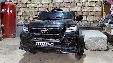 купить детскую игрушку машинку: Детский электромобиль Toyota (стилизованный под внедорожник) - Кузов — 2