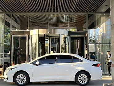 byd e6: Toyota Corolla: 2019 г., 1.8 л, Вариатор, Гибрид, Седан — 4
