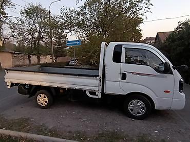 торпеды: Kia Bongo III бортовой грузовик (1 т) - Компактный городской грузовик — 2