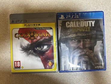 Oyun diskləri və kartricləri: Call of duty WW 2 (ps4), God Of War 3 (ps3) Ikisi bir yerdə