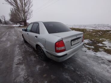 Mazda: Mazda 323: 1998 г., 1.5 л, Механика, Бензин, Седан