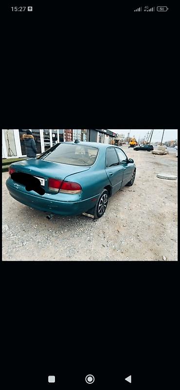 овальный: Mazda 626: 1993 г., 1.8 л, Механика, Бензин, Седан — 5