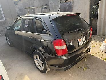 мустанг авто: Mazda 323: 2001 г., 2 л, Автомат, Газ, Универсал — 10