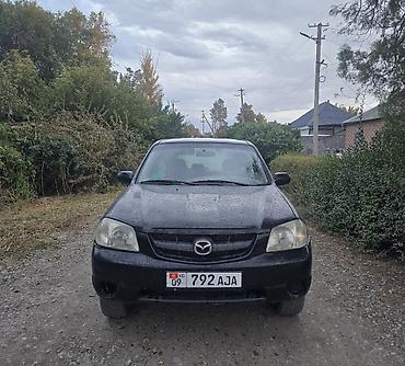 golf iii: Mazda Tribute: 2000 г., 2 л, Механика, Газ, Кроссовер — 7
