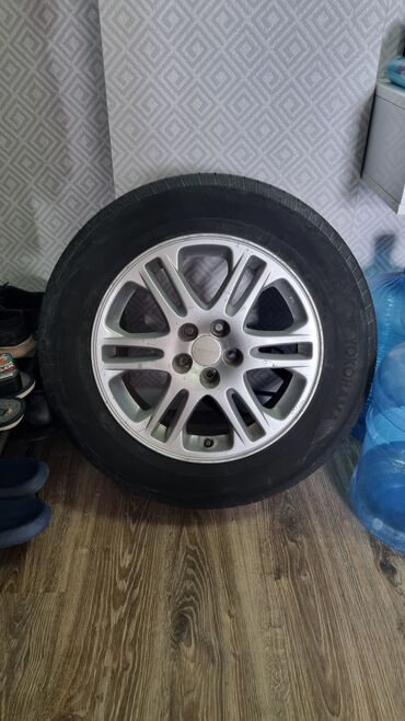 шины на ниву r16: Имеются три колеса от Subaru 205/65/R16. Резина в нормальном