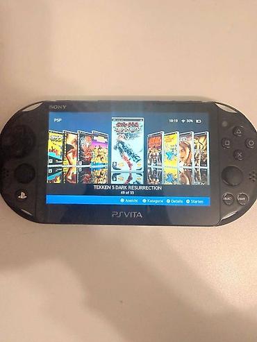 PS Vita (Sony Playstation Vita): Playstation vita ideal veziyyetdedir. Hec bir problemi yoxdu. Ciziqi — 1
