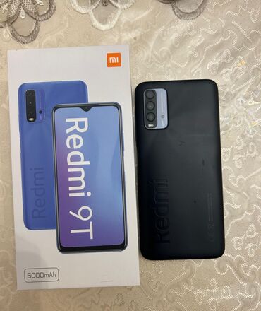 xiaomi redmi 8 qiymeti irshad telecom: Xiaomi Redmi 9T, 64 GB, rəng - Qara, 
 Barmaq izi, İki sim kartlı