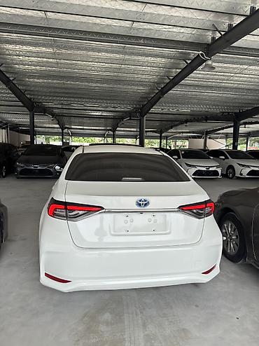 corolla 2022: Toyota Corolla: 2021 г., 1.8 л, Вариатор, Гибрид, Седан — 2
