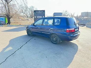 Kia: Kia Carens: 2005 г., Минивэн — 3