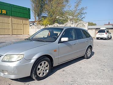 мазда демио шаравой: Mazda 323: 2003 г., 1.6 л, Механика, Бензин, Универсал — 2