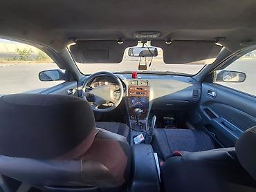 bmw e 38: Nissan Maxima: 3 l | 1999 il Sedan — 5