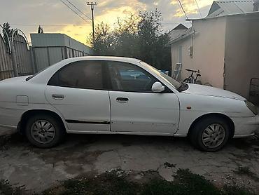 Daewoo Nubira: 2001 г., 1.5 л, Автомат, Бензин, Седан — 4
