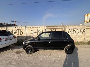 юмз куном: Daihatsu Cuore: 2002 г., 1 л, Механика, Бензин, Хэтчбэк — 5