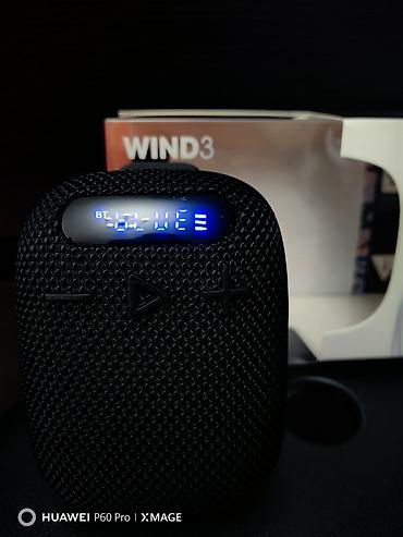 Продаю новую носимую блютуз колонку на клипсе JBL Wind 3