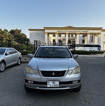 disk: Mitsubishi Airtrek (stansiya/wagon kuzov) – gümüşü rəng Texniki — 1