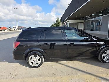 depozit masin: Opel Astra: 1.3 l | 2006 il 321000 km Universal — 5