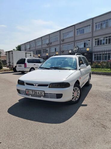 крабовые палочки цена бишкек: Белый универсал Mitsubishi Lancer, оснащенный багажником на крыше для