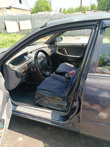 обвес 6 3: Mazda 626: 1994 г., 1.8 л, Механика, Бензин, Лифтбек — 5