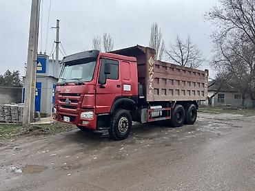 Другой строительный транспорт: Самосвал HOWO (CNHTC), красный, колесная формула 6x4. Основные — 1