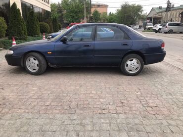 Mazda Cronos: 1994 г., 1.8 л, Механика, Бензин, Седан