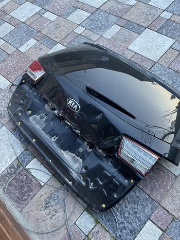 багажник голф: Крышка багажника Kia 2016 г., цвет - Черный,Оригинал