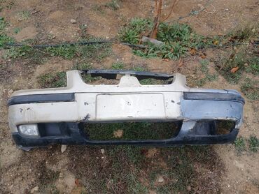 Motonəqliyyat: Avtomobilin ön bamperi - Material: plastik - Rəng: ağ/qara (iki