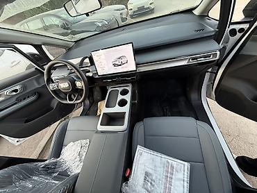 GAC: Электромобиль GAC (логотип G) — городской компактный MPV/кросс-хэтч с — 2